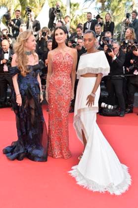 Caroline Scheufele, Demi Moore and Sophie Wilden at the KINDS OF KINDNESS premiere at the 77th Cannes Film Festival 17 05 2024