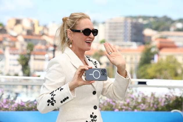May 18, 2024, Cannes, Cote D azur, France: UMA THURMAN films the official photographers during the Oh, Canada photocall at the 77th Annual Cannes Film Festival at Palais des Festivals in Cannes, France Cannes France - ZUMAc179 20240518_zep_c179_058 Copyright: xMickaelxChavetx