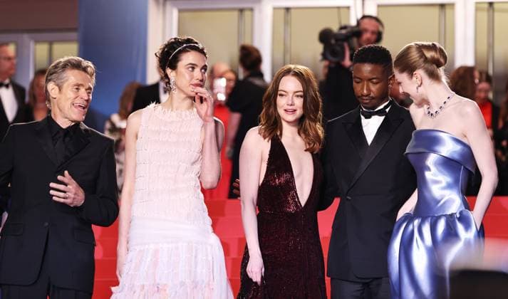 (240518) -- CANNES, May 18, 2024 -- U.S. actress Emma Stone (C) leaves with fellow cast members after the screening of the film Kinds of Kindness at the 77th edition of the Cannes Film Festival in Cannes, southern France, on May 17, 2024. ) FRANCE-CANNES-FILM FESTIVAL-KINDS OF KINDNESS GaoxJing 