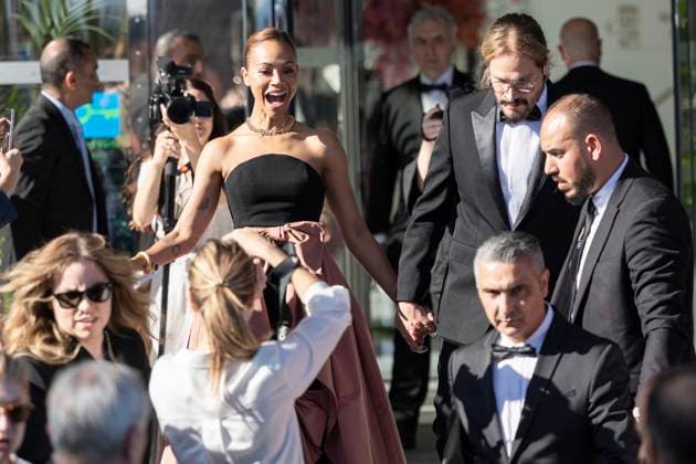 Cannes - Zoe Saldana And Marco Perego Exit Marriott Hotel Zoe Saldana, Marco Perego leave Marriott Hotel to attending the official screening of Emilia Perez during 77th Cannes Film Festival. France, Cannes on May 18, 2024. Photo by Marco Piovanotto ABACAPRESS.COM Cannes France  Copyright: xPiovanottoxMarco ABACAx