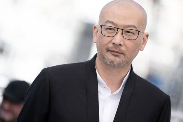 Annual Cannes Film Festival - Black Dog Photocall - Cannes DN Guan Hu attends the Black Dog Photocall at the 77th annual Cannes Film Festival at Palais des Festivals on May 18, 2024 in Cannes, France. Photo by David NIVIERE ABACAPRESS.COM CANNES France  Copyright: xNivierexDavid ABACAPRESS.COMx
