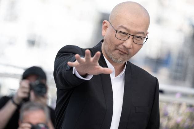 Annual Cannes Film Festival - Black Dog Photocall - Cannes DN Guan Hu attends the Black Dog Photocall at the 77th annual Cannes Film Festival at Palais des Festivals on May 18, 2024 in Cannes, France. Photo by David NIVIERE ABACAPRESS.COM CANNES France  Copyright: xNivierexDavid ABACAPRESS.COMx