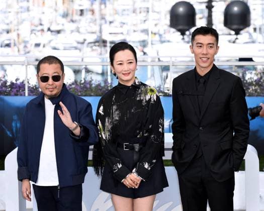 77th Cannes Film Festival 2024 Photocall film Caught By The Tides Cannes, 77th Cannes Film Festival 2024 Photocall film Caught By The Tides In the photo: Jia Zhangke, Zhao Tao, Zhou You Cannes France  Copyright: xIPA ABACAx