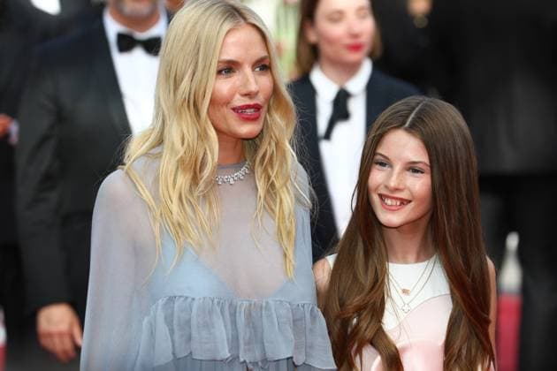 May 19, 2024, Cannes, Cote D azur, France: SIENNA MILLER walks the red carpet with her daughter MARLOWE STURRIDGE ahead of the Horizon: an American Saga Premiere screening at the 77th Annual Cannes Film Festival at Palais des Festivals in Cannes, France Cannes France - ZUMAc179 20240519_zep_c179_125 Copyright: xMickaelxChavetx