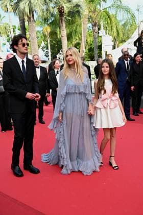 Cannes, 77th Cannes Film Festival 2024, Red Carpet Horizon: An American Saga Cannes, 77th Cannes Film Festival 2024, Red Carpet Horizon: An American Saga In the photo: Sienna Miller, Oli Green, Marlowe Sturridge Cannes France  Copyright: xIPA ABACAx