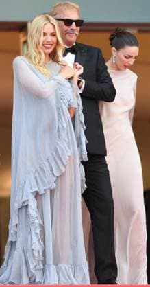 American actor director Kevin Costner and British actress Sienna Miller attend the premiere of Horizon: An American Saga at the 77th Cannes Film Festival in Cannes, France on Sunday, May 19, 2024.  CAN20240519191 RUNExHELLESTAD