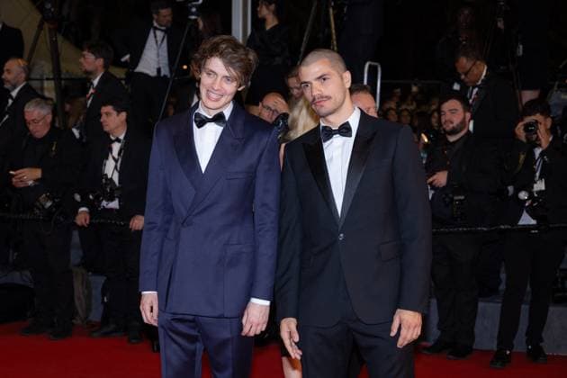 Cannes - The Substance Screening Oscar Lesage (L) and a guest attend the The Substance Red Carpet at the 77th annual Cannes Film Festival at Palais des Festivals on May 19, 2024 in Cannes, France. Photo by Shootpix ABACAPRESS.COM Cannes France  Copyright: xShootpix ABACAx