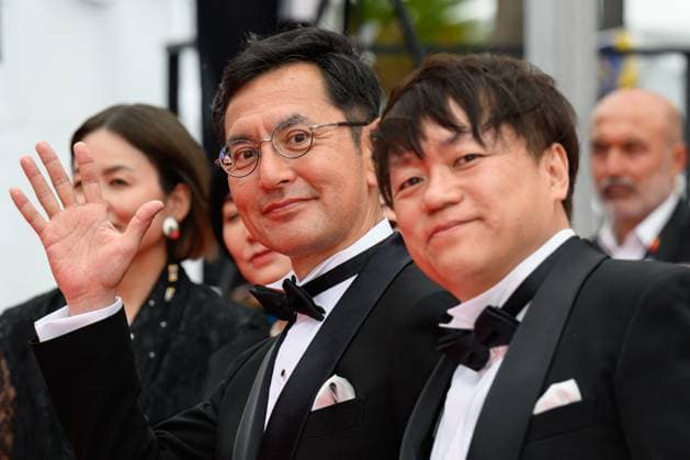 Cannes Palme D Or Winner Studio Ghibli Red Carpet NG Goro Miyazaki and Kenichi Yoda attending the ?Palme D Or Winner Studio Ghibli? Screening and Red Carpet at Palais Des Festivals in Cannes, France on May 20 2024 as part of the 77th Cannes Film Festival. Photo by Nicolas Genin ABACAPRESS.COM Cannes France  Copyright: xGeninxNicolas ABACAx