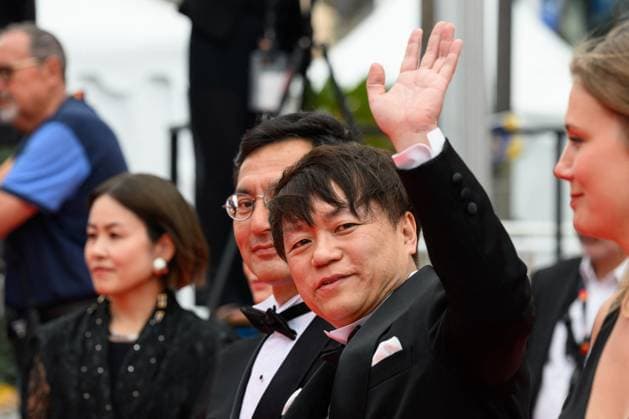 Cannes Palme D Or Winner Studio Ghibli Red Carpet NG Goro Miyazaki and Kenichi Yoda attending the ?Palme D Or Winner Studio Ghibli? Screening and Red Carpet at Palais Des Festivals in Cannes, France on May 20 2024 as part of the 77th Cannes Film Festival. Photo by Nicolas Genin ABACAPRESS.COM Cannes France  Copyright: xGeninxNicolas ABACAx