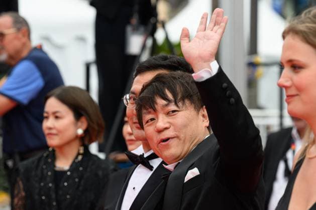 Cannes Palme D Or Winner Studio Ghibli Red Carpet NG Goro Miyazaki and Kenichi Yoda attending the ?Palme D Or Winner Studio Ghibli? Screening and Red Carpet at Palais Des Festivals in Cannes, France on May 20 2024 as part of the 77th Cannes Film Festival. Photo by Nicolas Genin ABACAPRESS.COM Cannes France  Copyright: xGeninxNicolas ABACAx