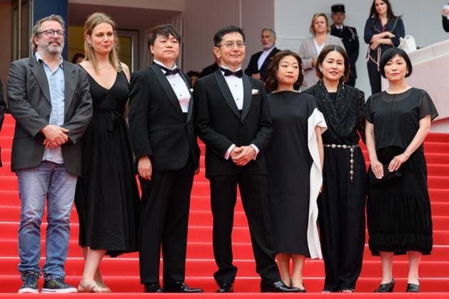 Cannes Palme D Or Winner Studio Ghibli Red Carpet NG Vincent Maraval, Livia Van Der Staay, Kenichi Yoda, and Goro Miyazaki attending the ?Palme D Or Winner Studio Ghibli? Screening and Red Carpet at Palais Des Festivals in Cannes, France on May 20 2024 as part of the 77th Cannes Film Festival. Photo by Nicolas Genin ABACAPRESS.COM Cannes France  Copyright: xGeninxNicolas ABACAx
