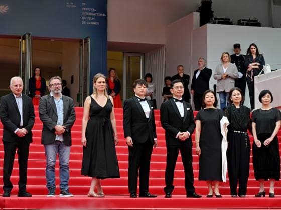 Cannes, 77th Cannes Film Festival 2024, Sixth evening - red carpet Palma d Or Studio Ghibli - In the photo: Vincent Maraval, Livia Van Der Staay, Kenichi Yoda, and Goro Miyazaki  Copyright: xManuelexMangiarottix xipa-agencyx xPoolxPhotoxEventsx03x IPA_Agency_IPA46310421
