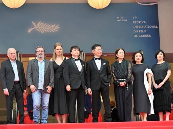 Cannes, 77th Cannes Film Festival 2024, Sixth evening - red carpet Palma d Or Studio Ghibli - In the photo: Vincent Maraval, Livia Van Der Staay, Kenichi Yoda, and Goro Miyazaki  Copyright: xManuelexMangiarottix xipa-agencyx xPoolxPhotoxEventsx03x IPA_Agency_IPA46310447