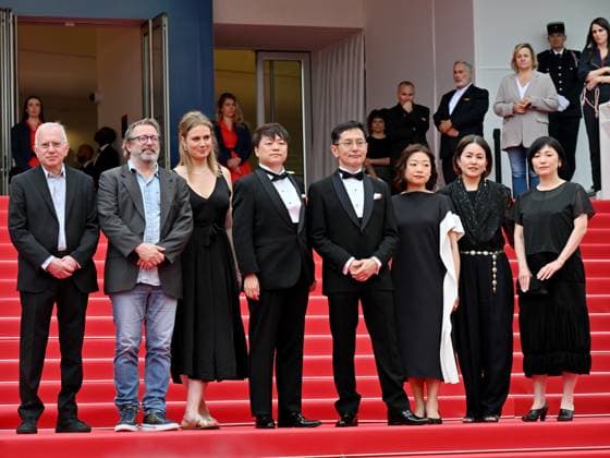 Cannes, 77th Cannes Film Festival 2024, Sixth evening - red carpet Palma d Or Studio Ghibli - In the photo: Vincent Maraval, Livia Van Der Staay, Kenichi Yoda, and Goro Miyazaki  Copyright: xManuelexMangiarottix xipa-agencyx xPoolxPhotoxEventsx03x IPA_Agency_IPA46310438