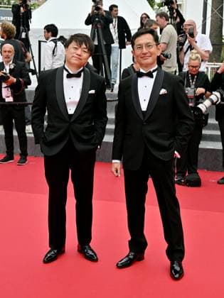 Cannes, France: Cannes, 77th Cannes Film Festival 2024, Sixth evening - red carpet Palma d Or Studio Ghibli - In the photo: Goro Miyazaki and Kenichi Yoda Cannes France  - ZUMAp169 20240520_zea_p169_637 Copyright: xManuelexMangiarottix