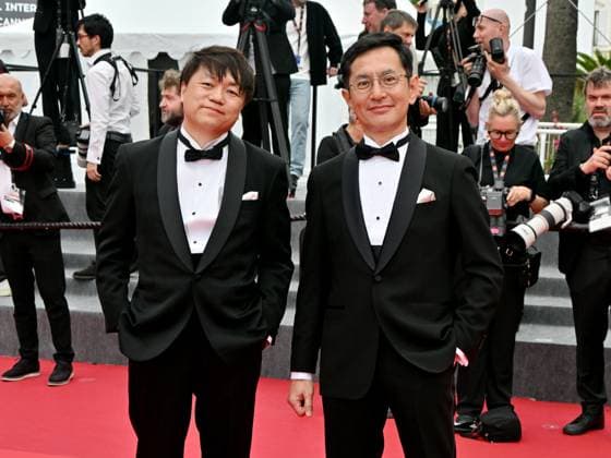 Cannes, France: Cannes, 77th Cannes Film Festival 2024, Sixth evening - red carpet Palma d Or Studio Ghibli - In the photo: Goro Miyazaki and Kenichi Yoda Cannes France  - ZUMAp169 20240520_zea_p169_639 Copyright: xManuelexMangiarottix