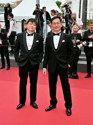 Cannes, France: Cannes, 77th Cannes Film Festival 2024, Sixth evening - red carpet Palma d Or Studio Ghibli - In the photo: Goro Miyazaki and Kenichi Yoda Cannes France  - ZUMAp169 20240520_zea_p169_641 Copyright: xManuelexMangiarottix