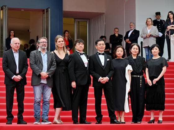 Cannes, France: Cannes, 77th Cannes Film Festival 2024, Sixth evening - red carpet Palma d Or Studio Ghibli - In the photo: Vincent Maraval, Livia Van Der Staay, Kenichi Yoda, and Goro Miyazaki Cannes France  - ZUMAp169 20240520_zea_p169_653 Copyright: xManuelexMangiarottix