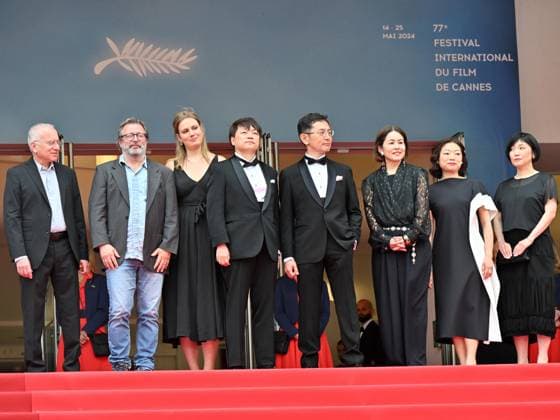 Cannes, France: Cannes, 77th Cannes Film Festival 2024, Sixth evening - red carpet Palma d Or Studio Ghibli - In the photo: Vincent Maraval, Livia Van Der Staay, Kenichi Yoda, and Goro Miyazaki Cannes France  - ZUMAp169 20240520_zea_p169_657 Copyright: xManuelexMangiarottix