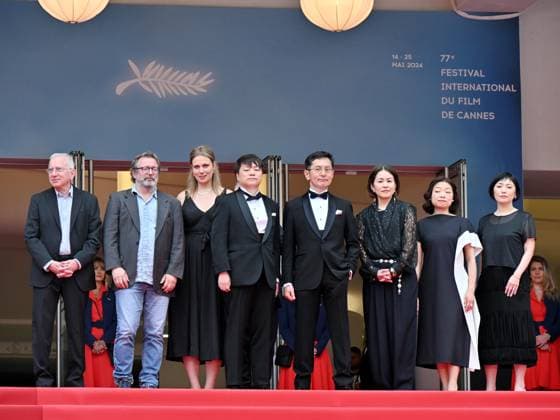 Cannes, France: Cannes, 77th Cannes Film Festival 2024, Sixth evening - red carpet Palma d Or Studio Ghibli - In the photo: Vincent Maraval, Livia Van Der Staay, Kenichi Yoda, and Goro Miyazaki Cannes France  - ZUMAp169 20240520_zea_p169_659 Copyright: xManuelexMangiarottix