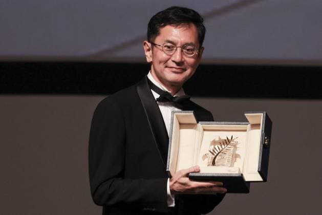 Cannes Palme D Or D Honneur To Studio Ghibli Ceremony DB Goro Miyazaki poses with the award during the ceremony for the Palme D Or D Honneur to Studio Ghibli at the 77th annual Cannes Film Festival at Palais des Festivals on May 20, 2024 in Cannes, France. Photo by David Boyer ABACAPRESS.COM Cannes France  Copyright: xBoyerxDavid ABACAx
