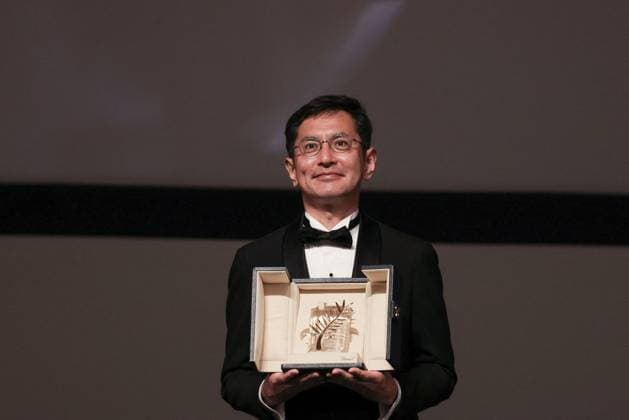 Cannes Palme D Or D Honneur To Studio Ghibli Ceremony DB Goro Miyazaki poses with the award during the ceremony for the Palme D Or D Honneur to Studio Ghibli at the 77th annual Cannes Film Festival at Palais des Festivals on May 20, 2024 in Cannes, France. Photo by David Boyer ABACAPRESS.COM Cannes France  Copyright: xBoyerxDavid ABACAx