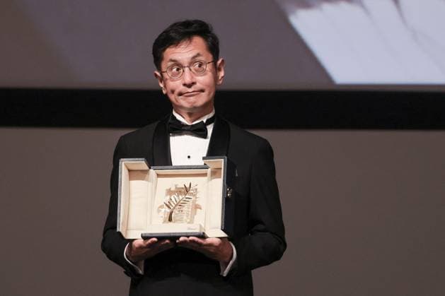 Cannes Palme D Or D Honneur To Studio Ghibli Ceremony DB Goro Miyazaki poses with the award during the ceremony for the Palme D Or D Honneur to Studio Ghibli at the 77th annual Cannes Film Festival at Palais des Festivals on May 20, 2024 in Cannes, France. Photo by David Boyer ABACAPRESS.COM Cannes France  Copyright: xBoyerxDavid ABACAx