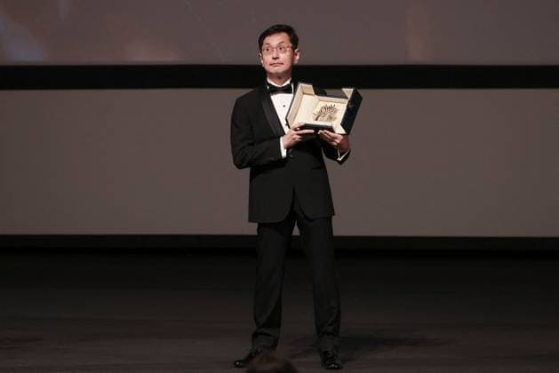 Cannes Palme D Or D Honneur To Studio Ghibli Ceremony DB Goro Miyazaki poses with the award during the ceremony for the Palme D Or D Honneur to Studio Ghibli at the 77th annual Cannes Film Festival at Palais des Festivals on May 20, 2024 in Cannes, France. Photo by David Boyer ABACAPRESS.COM Cannes France  Copyright: xBoyerxDavid ABACAx