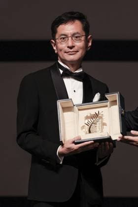 Cannes Palme D Or D Honneur To Studio Ghibli Ceremony DB Goro Miyazaki poses with the award during the ceremony for the Palme D Or D Honneur to Studio Ghibli at the 77th annual Cannes Film Festival at Palais des Festivals on May 20, 2024 in Cannes, France. Photo by David Boyer ABACAPRESS.COM Cannes France  Copyright: xBoyerxDavid ABACAx