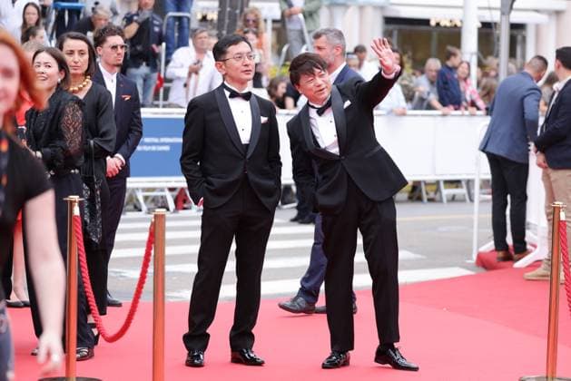 Cannes Palme D Or Winner Studio Ghibli Screening DB Kenichi Yoda, and Goro Miyazaki attending the Palme D Or Winner Studio Ghibli at the 77th annual Cannes Film Festival at Palais des Festivals on May 20, 2024 in Cannes, France. Photo by David Boyer ABACAPRESS.COM Cannes France  Copyright: xBoyerxDavid ABACAx