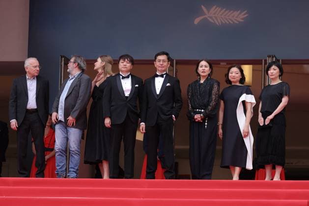 Cannes Palme D Or Winner Studio Ghibli Screening DB Vincent Maraval, Livia Van Der Staay, Kenichi Yoda, and Goro Miyazaki and guests attends the Palme D Or Winner Studio Ghibli at the 77th annual Cannes Film Festival at Palais des Festivals on May 20, 2024 in Cannes, France. Photo by David Boyer ABACAPRESS.COM Cannes France  Copyright: xBoyerxDavid ABACAx