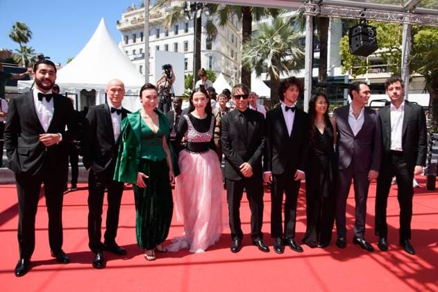 Cannes Anora Red Carpet NG Alex Coco, Karren Karagulian, Samantha Quan, Sean S. Baker, Mark Eydelshteyn, Mikey Madison, Darya Ekamasova, Jurij Borisov and Vache Tovmasyan attending the ?Anora? Screening and Red Carpet at Palais Des Festivals in Cannes, France on May 21 2024 as part of the 77th Cannes Film Festival. Photo by Nicolas Genin ABACAPRESS.COM Cannes France  Copyright: xGeninxNicolas ABACAx