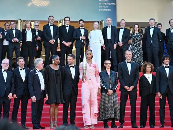 Cannes, 77th Cannes Film Festival 2024, Eighth evening - Red carpet film Marcello Mio - In the photo: The Olympic Torch for Paris 2024 arrives on the Red Carpet  Copyright: xManuelexMangiarottix xipa-agencyx xPoolxPhotoxEventsx03x IPA_Agency_IPA46374181