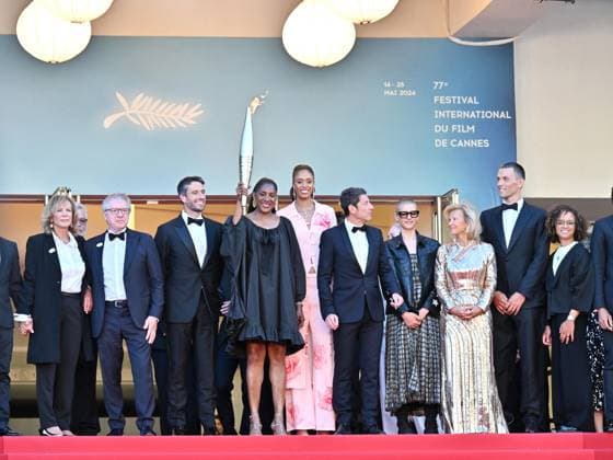 Cannes, 77th Cannes Film Festival 2024, Eighth evening - Red carpet film Marcello Mio - In the photo: The Olympic Torch for Paris 2024 arrives on the Red Carpet  Copyright: xManuelexMangiarottix xipa-agencyx xPoolxPhotoxEventsx03x IPA_Agency_IPA46374184