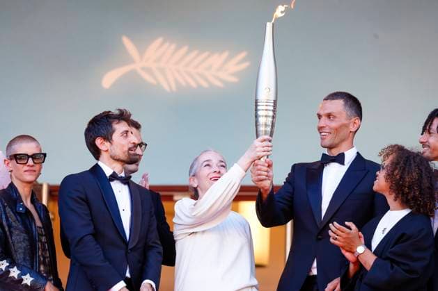May 21, 2024: Delphine Ernotte-Cunci, Iliana Rupert, Alexis Hanquinquant, Nelia Barbosa and Arnaud Assoumani hold the Olympic Flame at the red carpet premiere of Marcello Mio during the 77th Cannes Film Festival at Palais des Festivals in Cannes, France, on 21 May 2024. Photo: - ZUMAm179 20240521_zep_m179_068 Copyright: xAlecxMichaelx