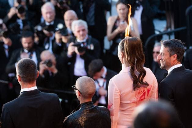 Cannes Marcello Mio Premiere Tony Estanguet and Iliana Rupert holding the Olympic Flame attending the Marcello Mio Premiere as part of the 77th Cannes International Film Festival in Cannes, France on May 20, 2024. Photo by Aurore Marechal ABACAPRESS.COM Cannes France  Copyright: xMarechalxAurore ABACAx