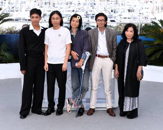 Cannes, France: Cannes, 77th Cannes Film Festival 2024 Photocall film The Village Next To Paradise In the photo: Dao Duy Bao Dinh, Minh Quy Truong, PhaÂºÂ¡m Thanh Hai, Le Viet Tung, Nguyen Thi Nga Cannes France  - ZUMAp169 20240522_zea_p169_089 Copyright: xAlbertoxTerenghix