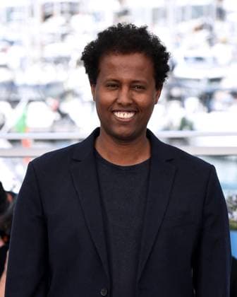 Cannes, France: Cannes, 77th Cannes Film Festival 2024 Photocall film The Village Next To Paradise In the photo: Mo Harawe Cannes France  - ZUMAp169 20240522_zea_p169_103 Copyright: xAlbertoxTerenghix