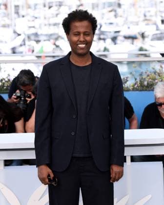 Cannes, France: Cannes, 77th Cannes Film Festival 2024 Photocall film The Village Next To Paradise In the photo: Mo Harawe Cannes France  - ZUMAp169 20240522_zea_p169_104 Copyright: xAlbertoxTerenghix