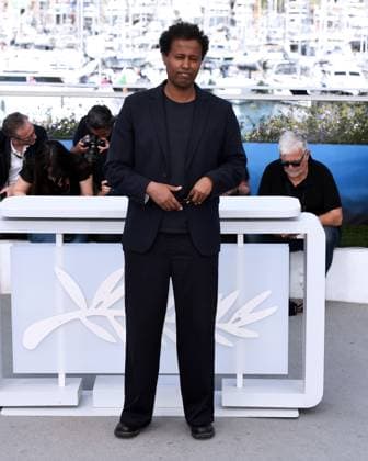 Cannes, France: Cannes, 77th Cannes Film Festival 2024 Photocall film The Village Next To Paradise In the photo: Mo Harawe Cannes France  - ZUMAp169 20240522_zea_p169_102 Copyright: xAlbertoxTerenghix