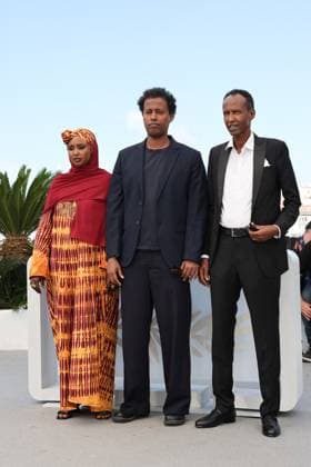 Cannes - The Village Next To Paradise Photocall Anab Ahmed Ibrahim, Mo Harawe and Ahmed Ali Farah attend the The Village Next To Paradise Photocall at the 77th annual Cannes Film Festival at Palais des Festivals on May 22, 2024 in Cannes, France. Photo by Shootpix ABACAPRESS.COM Cannes France  Copyright: xShootpix ABACAx