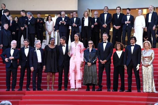 Thierry Fremaux, David Lisnard, Thierry Rey, Marie Jose Perec, Tony Estanguet, Iliana Rupert, Marie Patouillet, Alexis Hanquinquant, Nelia Barbosa, Arnaud Assoumani and Iris Knobloch with the Olympic Flame at the Marcello Mio film premiere on 21 05 2024 as part of the 77 Film Festival in Cannes Cannes Film Festival 2024 Marcello Mio film premiere