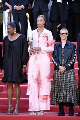 Marie Jose Perec, Iliana Rupert and Marie Patouillet with the Olympic Flame at the Marcello Mio film premiere on 21 05 2024 as part of the 77 Film Festival in Cannes Cannes Film Festival 2024 Marcello Mio film premiere