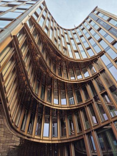 Creative Highlights World A low angle shot of curved modern architecture in Oslo, Norway 24539403