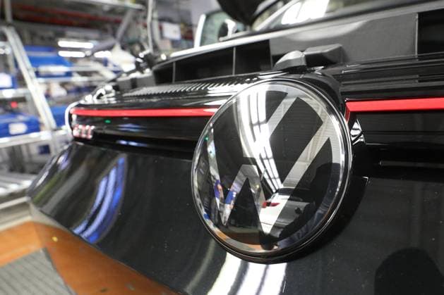 Wolfsburg Lower Saxony Wolfsburg, 23 05 2024, Volkswagen plant Wolfsburg, VW Golf and VW Tiguan production, VW Golf 8 GTI production line, VW logo
