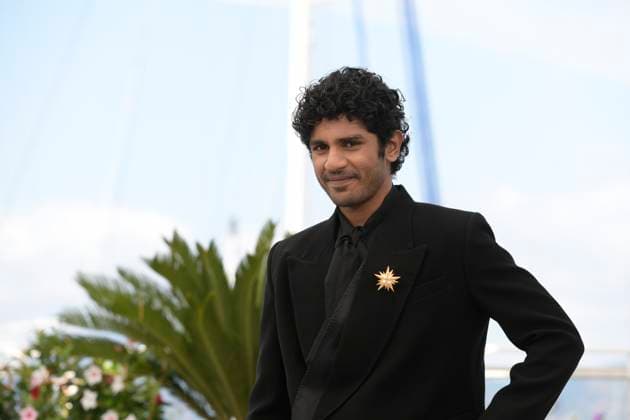CANNES, FRANCE MAY 24 G D Hridhu HAROON, actor, during the photocall of the film All we imagine as light in competition at the 77th Cannes Film Festival at the Palais des Festivals on May 24, 2024 in Cannes, France CINEMA 77eme Festival de Cannes Photocall 24 05 2024 ValentinaClaret Panoramic 
