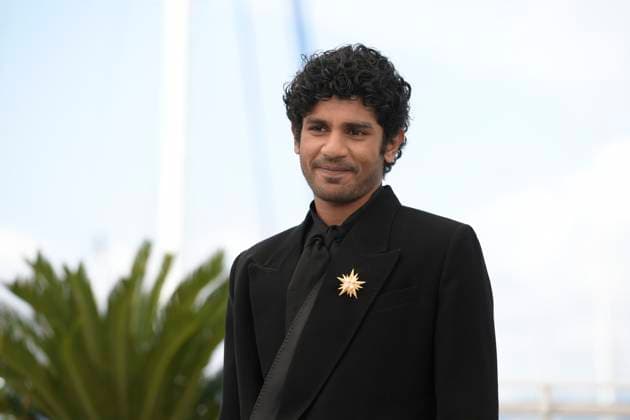 CANNES, FRANCE MAY 24 G D Hridhu HAROON, actor, during the photocall of the film All we imagine as light in competition at the 77th Cannes Film Festival at the Palais des Festivals on May 24, 2024 in Cannes, France CINEMA 77eme Festival de Cannes Photocall 24 05 2024 ValentinaClaret Panoramic 