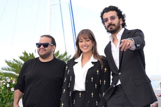 CANNES, FRANCE MAY 24 G D Tawfik ALZAIDI, director, Yaqoub ALFARHAN, actor, Maria BAHRAWI, actress, during the photocall of the film Â Norah Â in compÃ tition Un Certain Regard at the 77th Cannes Film Festival at the Palais des Festivals on May 24, 2024 in Cannes, France CINEMA 77eme Festival de Cannes Photocall 24 05 2024 ValentinaClaret Panoramic 