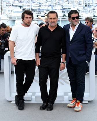 Cannes, France: Cannes, 77th Cannes Film Festival 2024 Photocall film : Ã¢â‚¬oeL Amour Ouf (Beating Hearts) In the photo: Hugo Selignac, Gilles Lellouche, Alain Attal Cannes France  - ZUMAp169 20240524_zea_p169_747 Copyright: xAlbertoxTerenghix