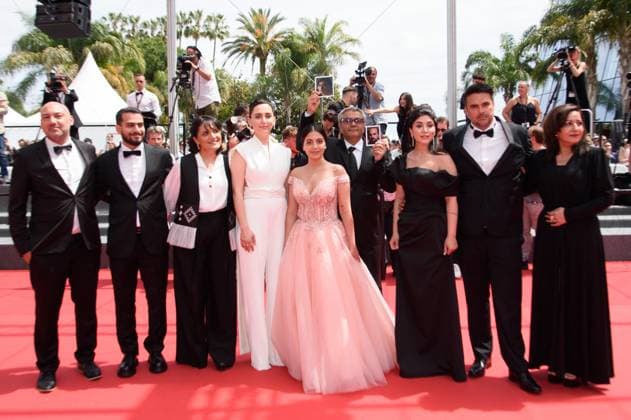 Cannes The Seed Of The Sacred Fig Red Carpet NG Mahsa Rostami, Soheila Golestani, Mohammad Rasoulof and the cast and crew attending the ?The Seed Of The Sacred Fig? Screening and Red Carpet at Palais Des Festivals in Cannes, France on May 24 2024 as part of the 77th Cannes Film Festival. Photo by Nicolas Genin ABACAPRESS.COM Cannes France  Copyright: xGeninxNicolas ABACAx